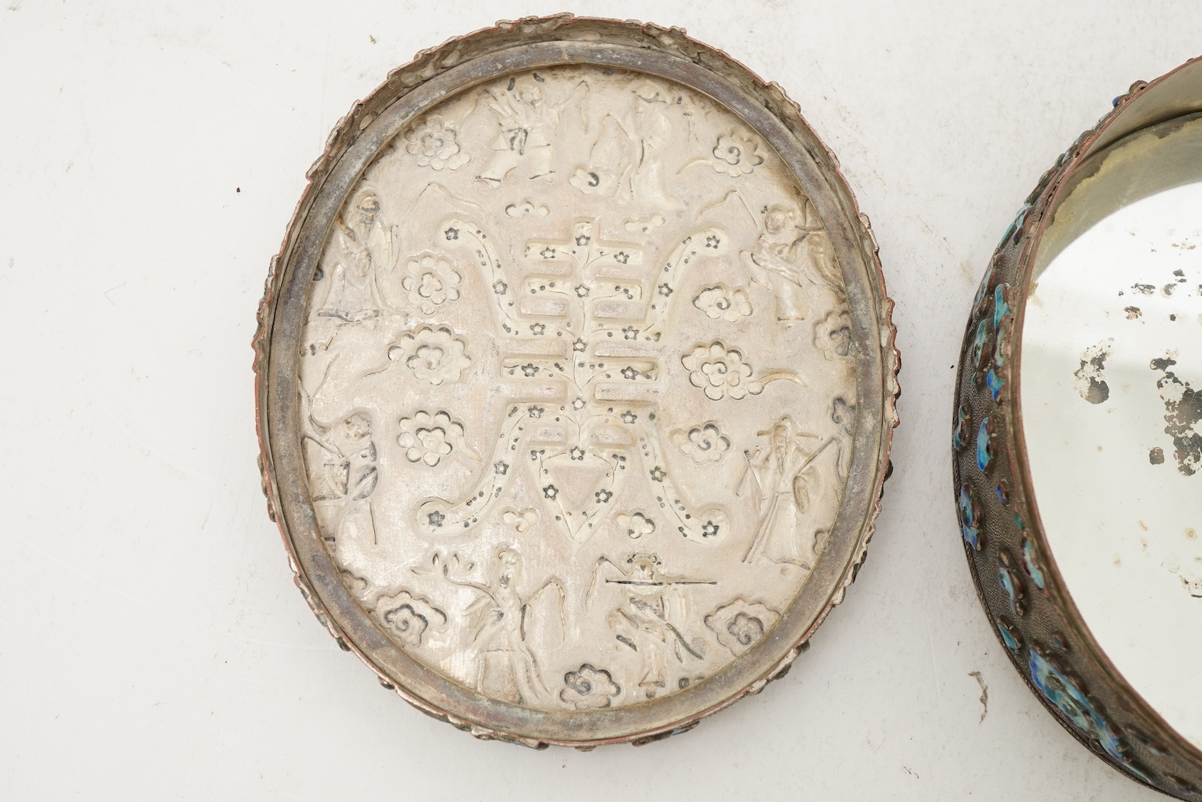 A Chinese silver plated and enamel ‘eight immortals’ oval box, late 19th century